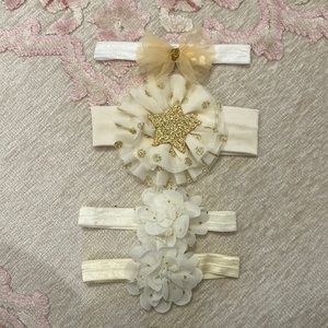 Never used - set of 4 misc. gold and white baby girl headbands